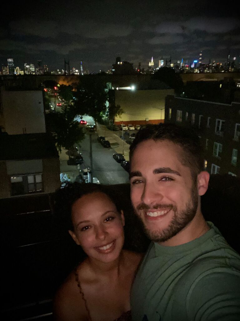 Josh and Stacey spent many nights looking out across the city on Josh's apartment building roof in Astoria. This picture was taken at Josh's homecoming after returning to NYC from his time in Cape Cod. 
