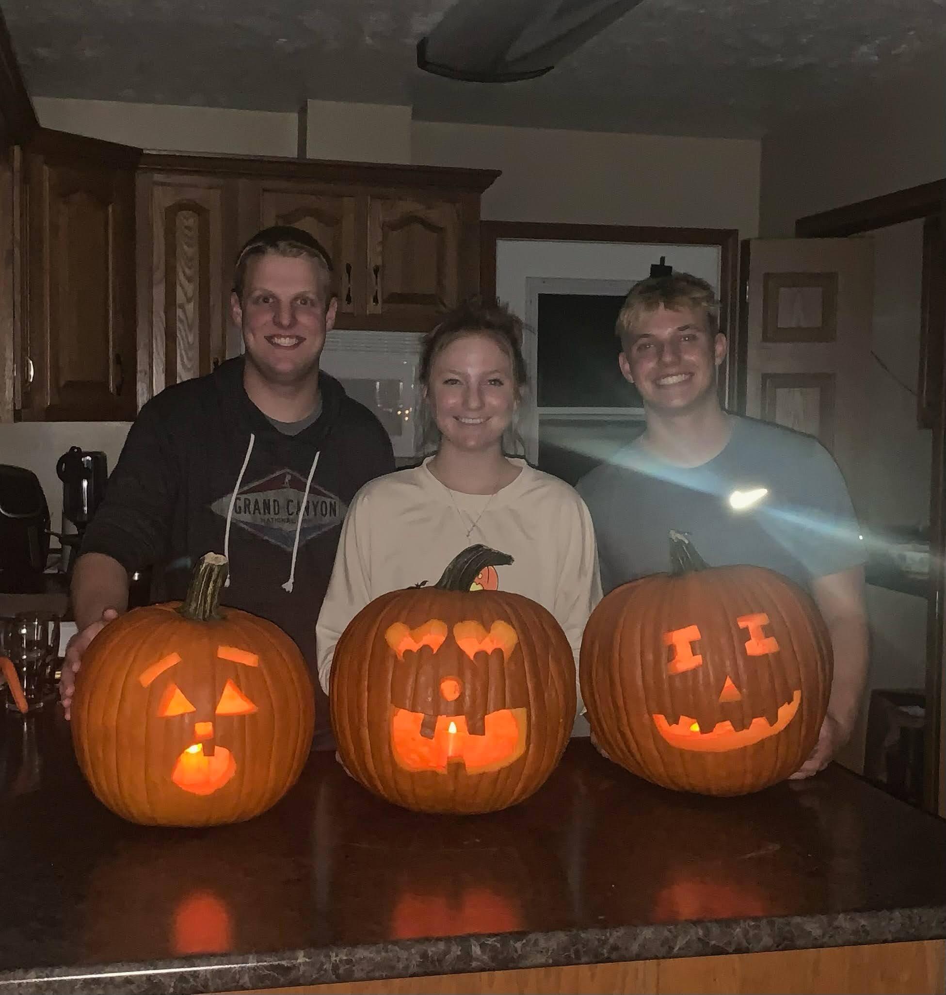 Carving pumpkins with Gracie's brother, Tyler