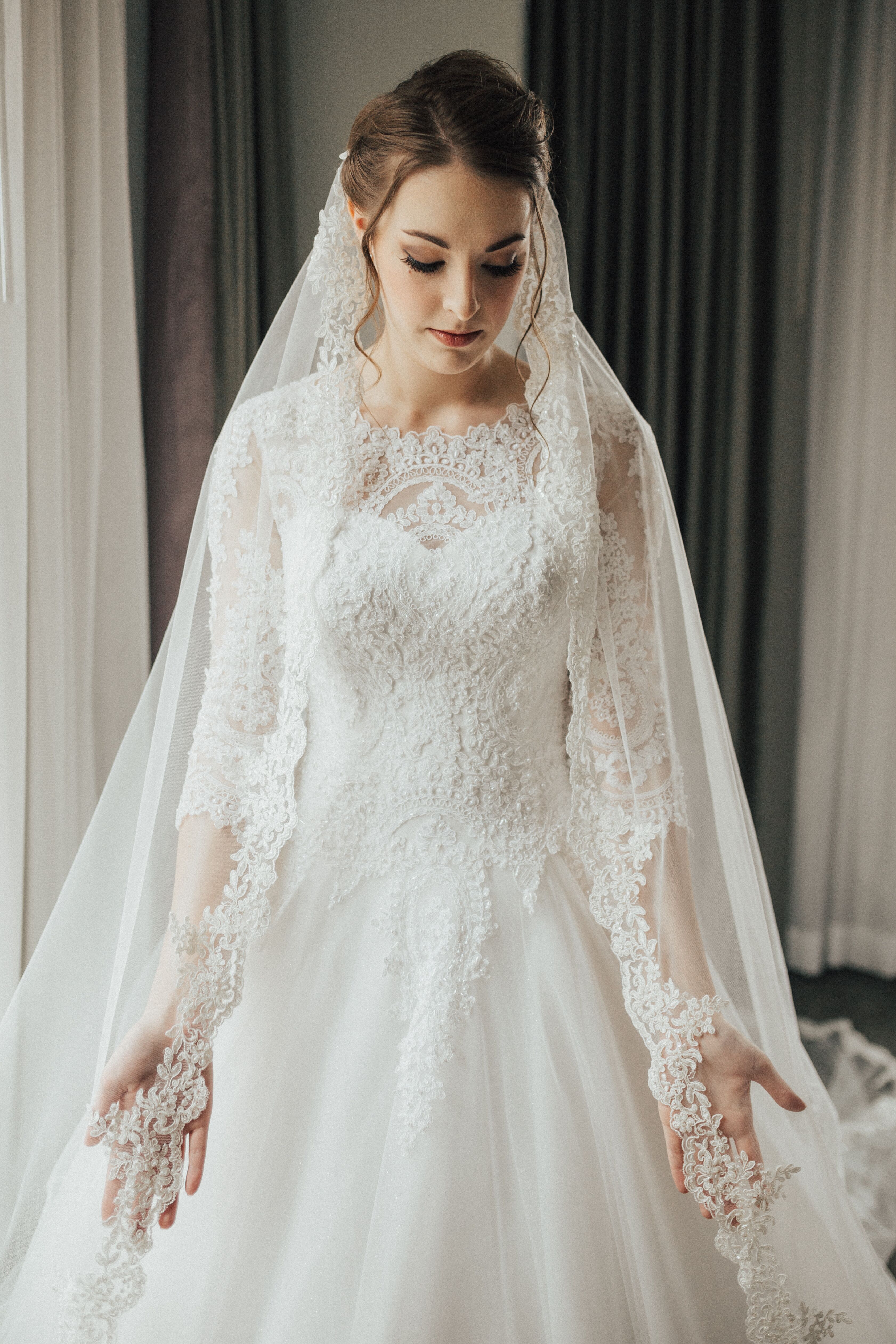 jenna in white bridal boutique