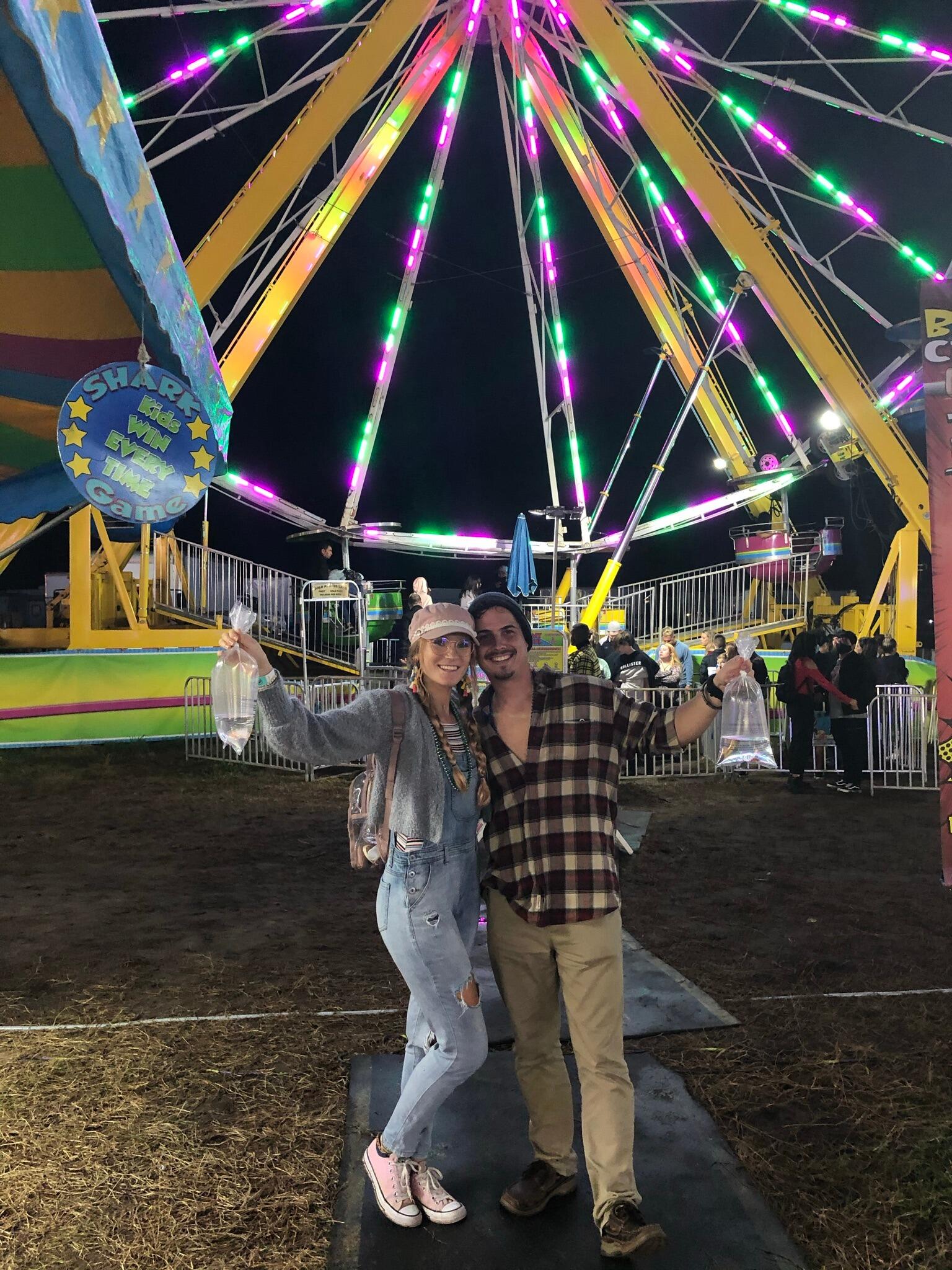 First fair experience together! They won gold fish & named them Hansel and Gretel!