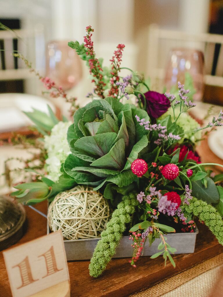 unique wedding centerpiece with ornamental kale, hops stalks and flowers