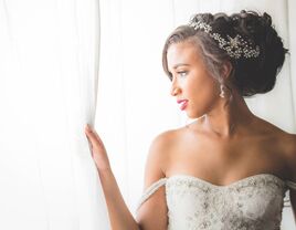 bride with romantic updo and headpiece