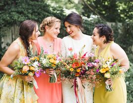 Bride posing with bridesmaids