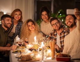 Friends gathered together for a Thanksgiving selfie