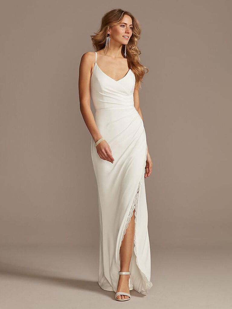 david's bridal white sheath wedding slip dress with light ruching v-neckline spaghetti straps and plain flowy skirt with lace trimmed slit