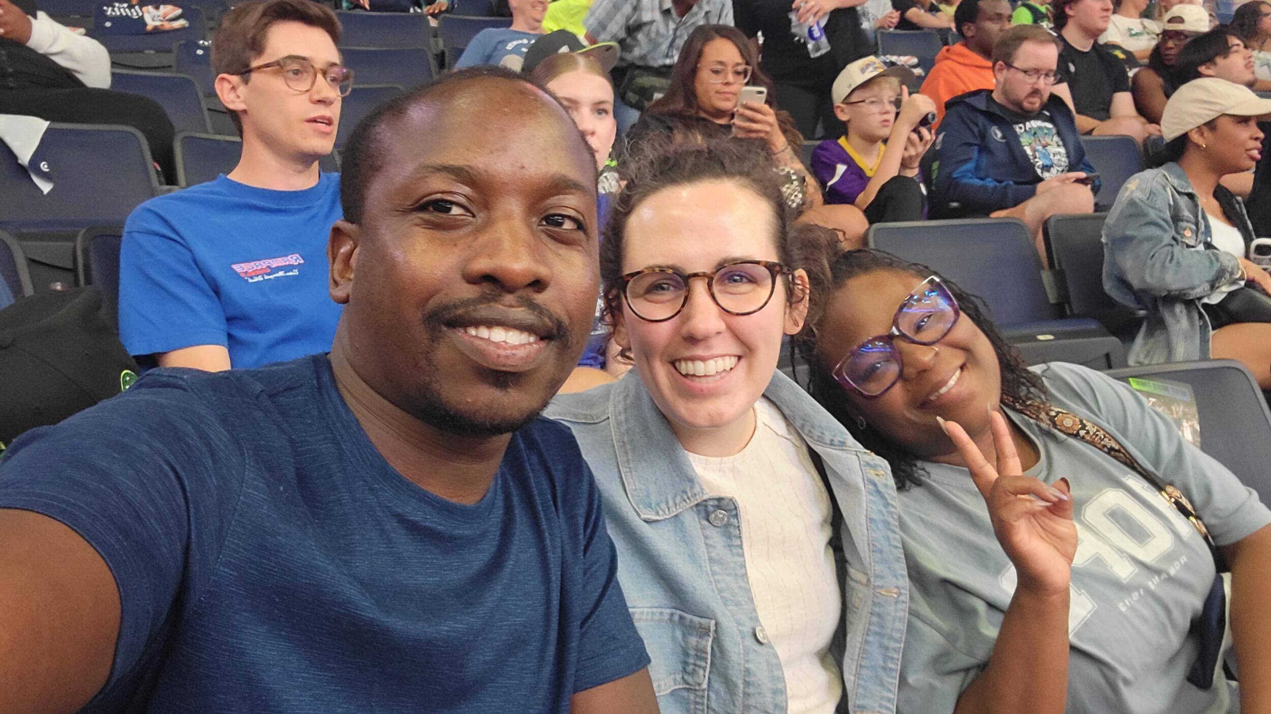 Within five dates we knew we were going to get married. This picture is from a Lynx game where we surprised our friend Keta with the fact that we were now officially dating. This was a favorite date for both of us as after the game we got to walk around town and share the backstory of what God had been doing to bring us together.