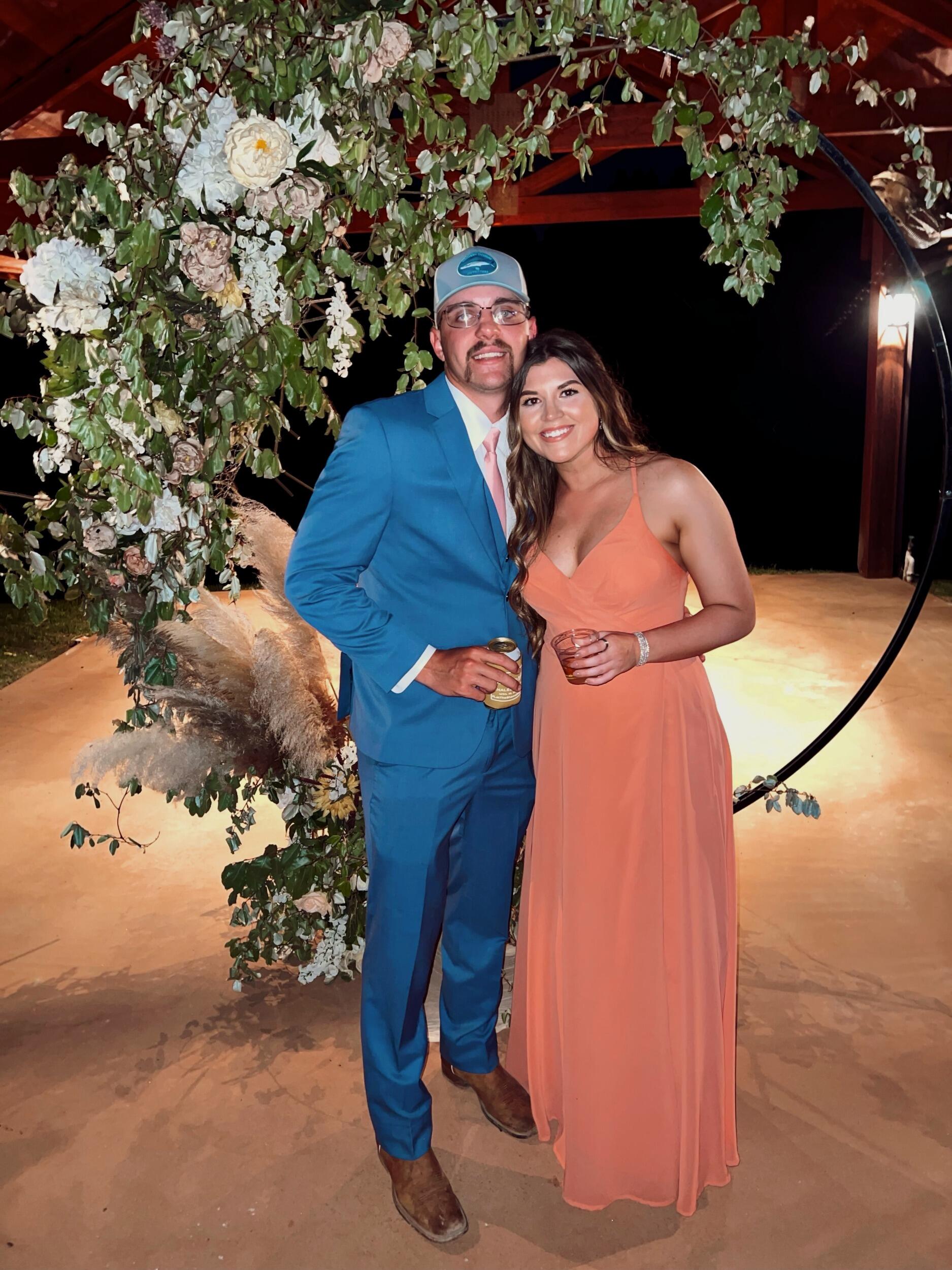 This is when I knew he was a keeper. He drove all the way to West Monroe to make it to my best friend's wedding reception! 