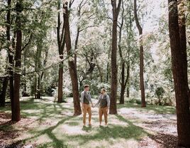 Men pose for a western engagement photo shoot