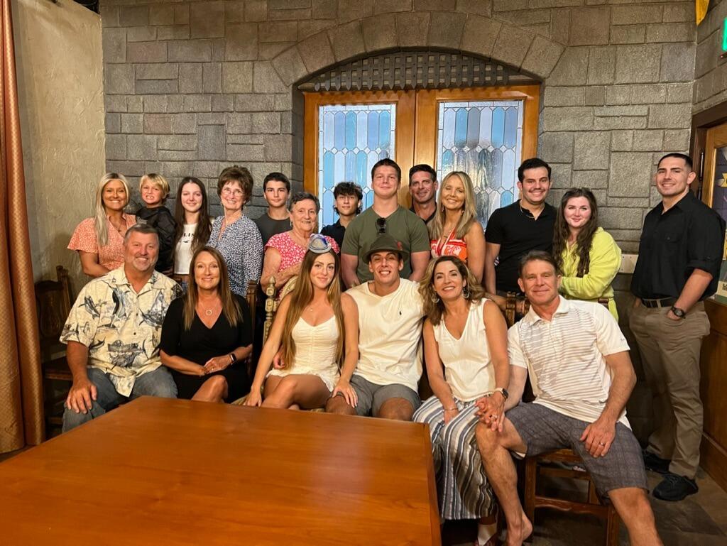 Emma and Brett's families celebrating their engagement at Willow Tree Café!