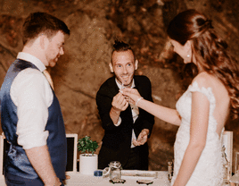 Budtender at wedding serving the bride and the groom.