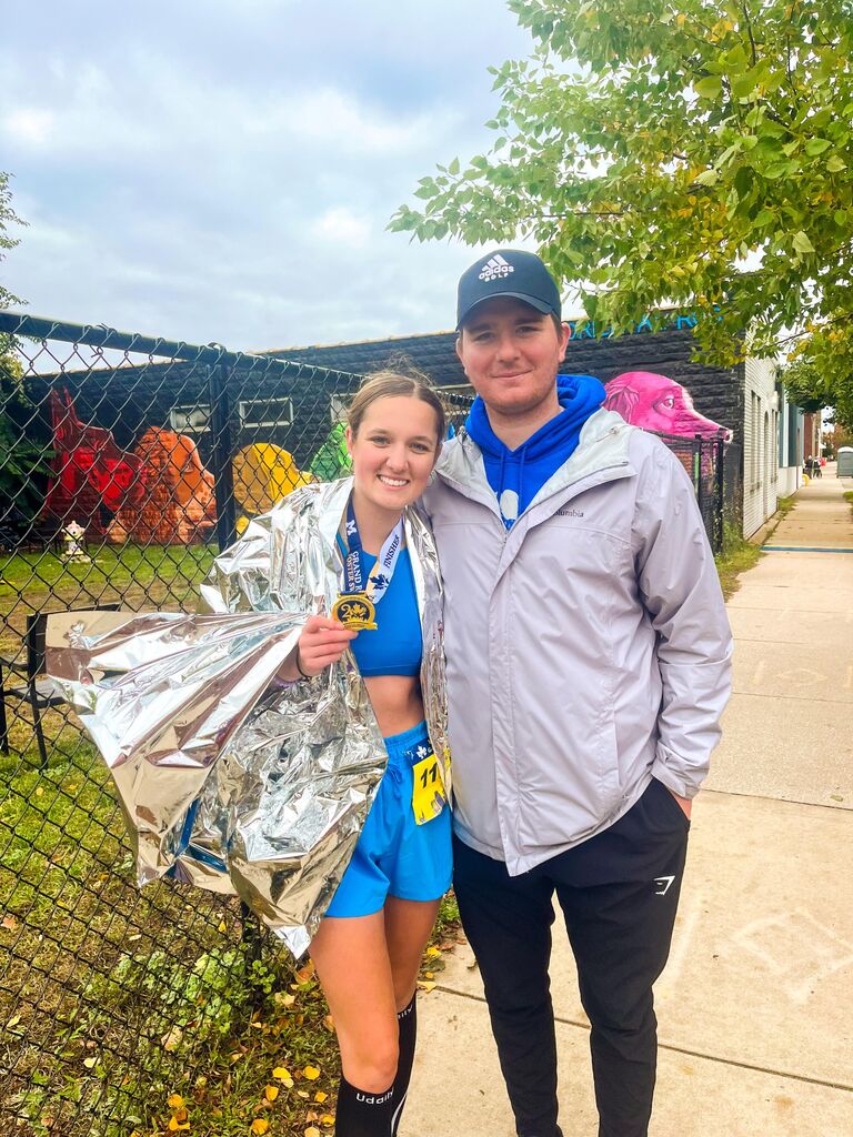 Mark came home to watch Gracie run her 3rd half marathon in Grand Rapids Michigan.