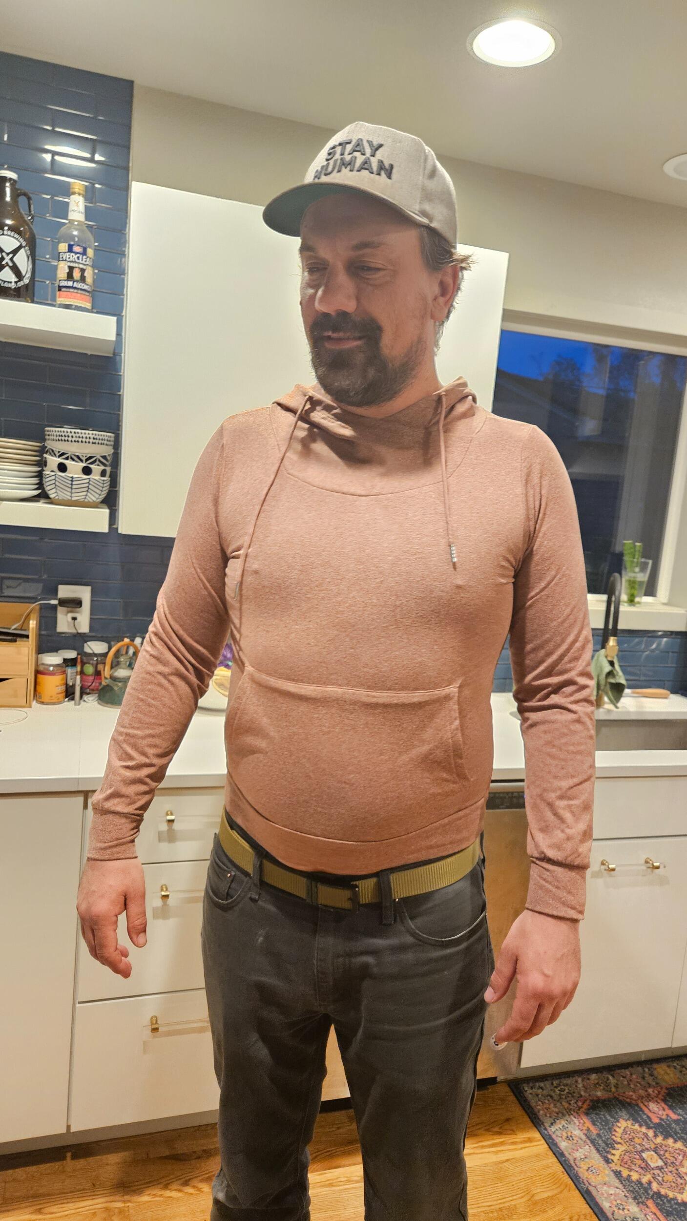 Martin insists he can share Ashley's clothes and proves it by putting on her sweatshirt.