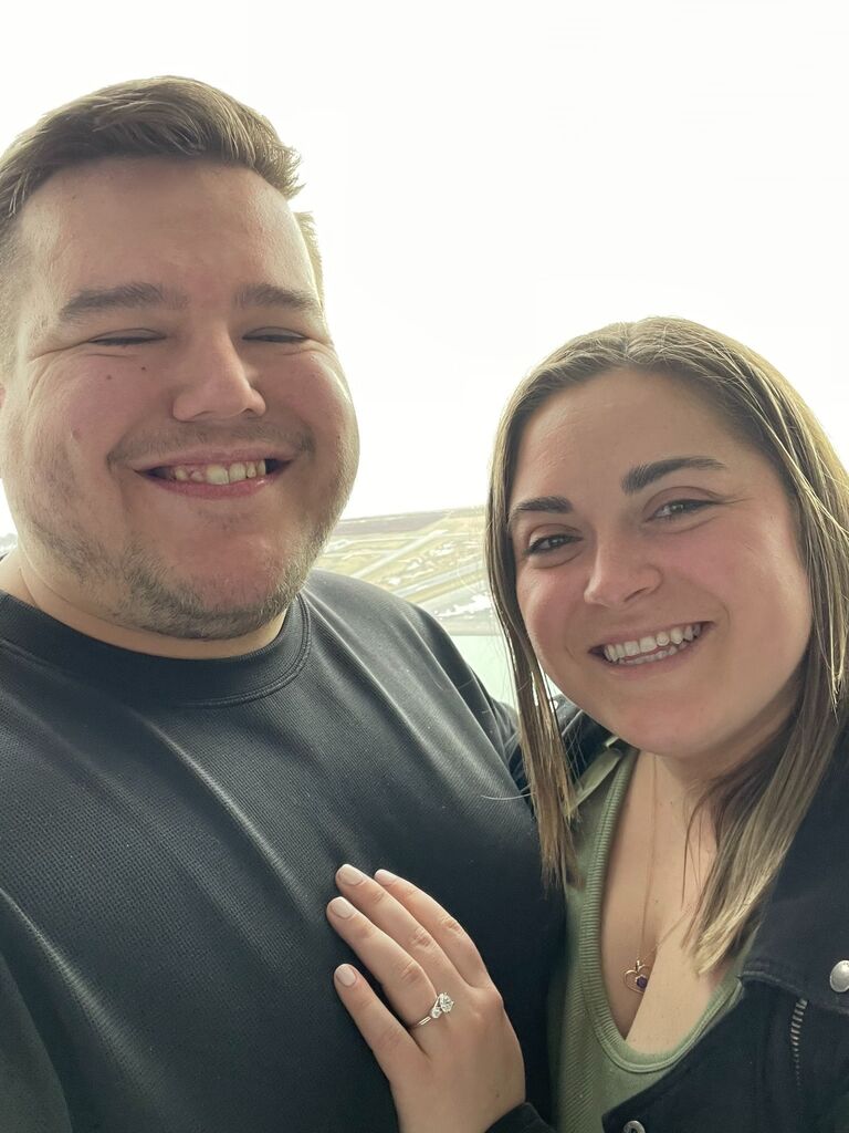 We're engaged!! Minutes before the eclipse in the CN Tower. 