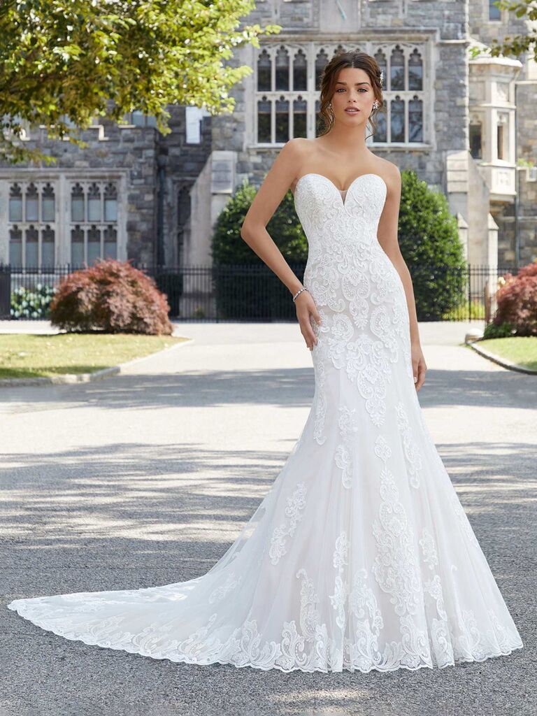 morilee white strapless sheath wedding dress with sweetheart neckline lace chest and form fitting pleated flowy lace skirt