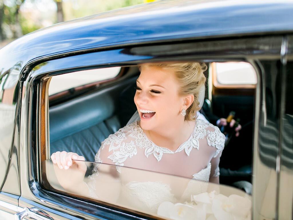 bride in vintage car