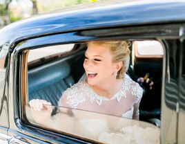 bride in vintage car