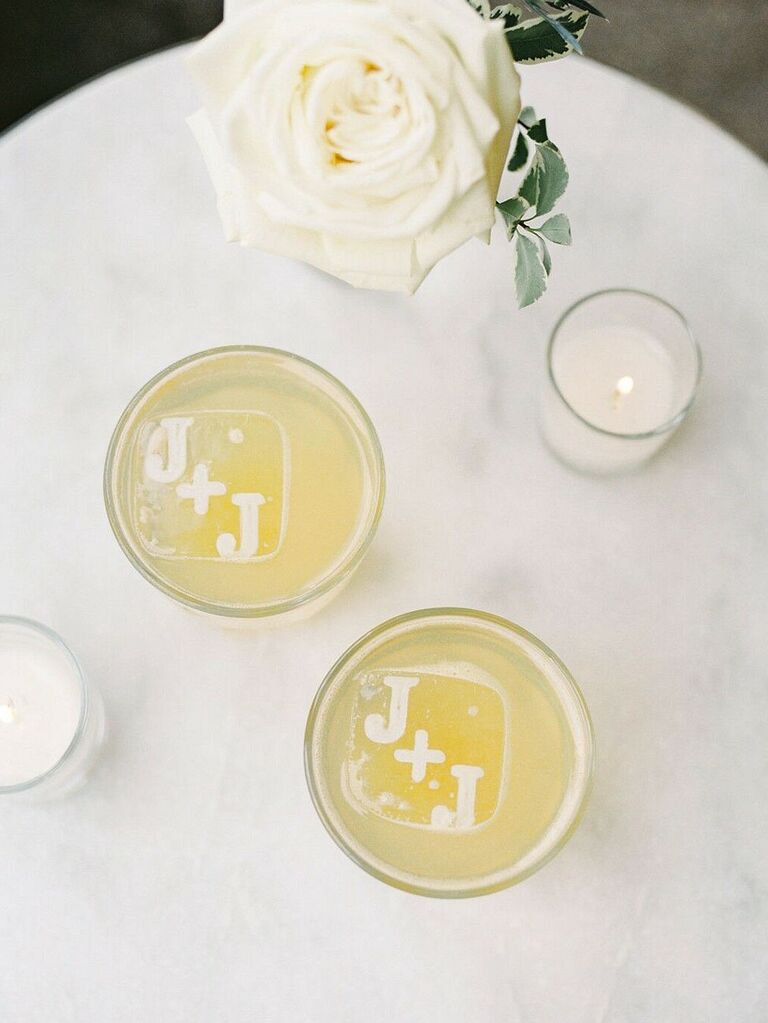 monogrammed ice cubes in cocktail glasses for signature wedding drink