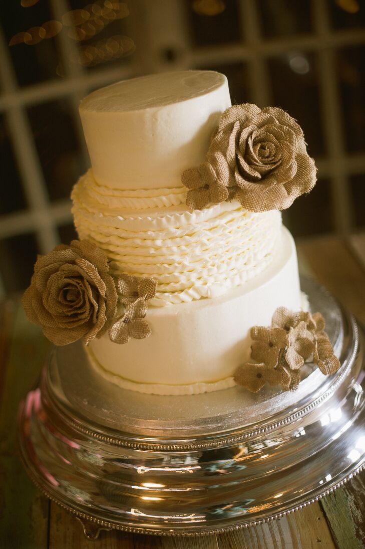 White Wedding Cake With Burlap Flowers