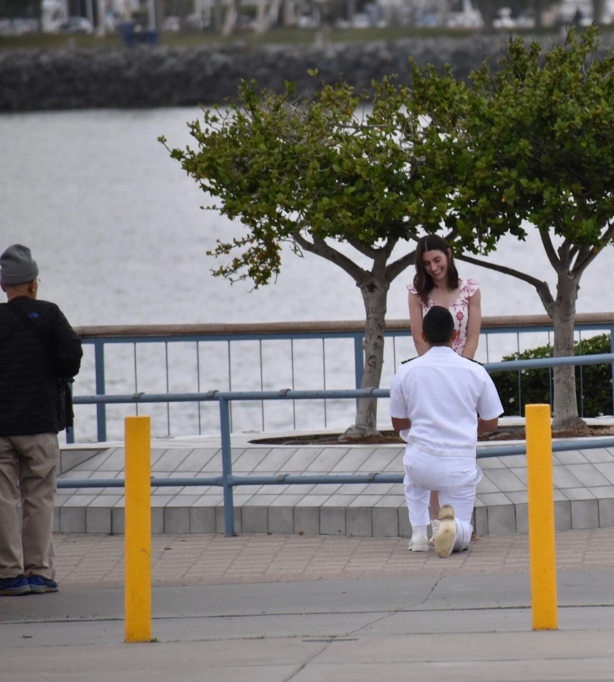 An elderly gentleman was at the ready, insisting that he take a picture for them. Gabe assured him that a photographer was already on the job.