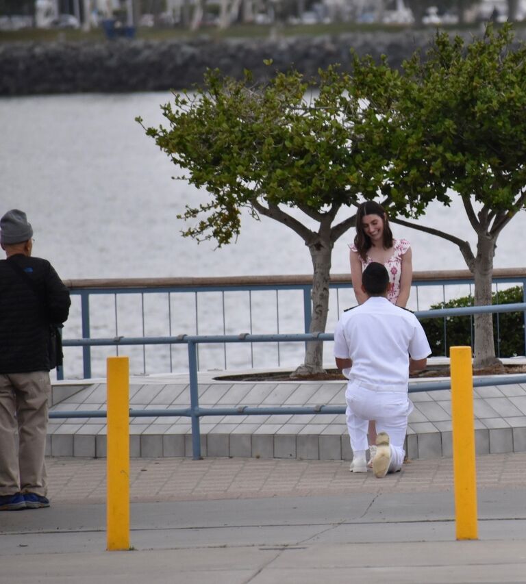An elderly gentleman was at the ready, insisting that he take a picture for them. Gabe assured him that a photographer was already on the job.
