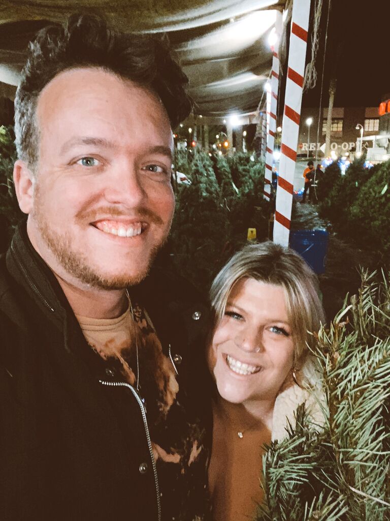 Bought their first Christmas tree together! 

These days, they just cut one down. 