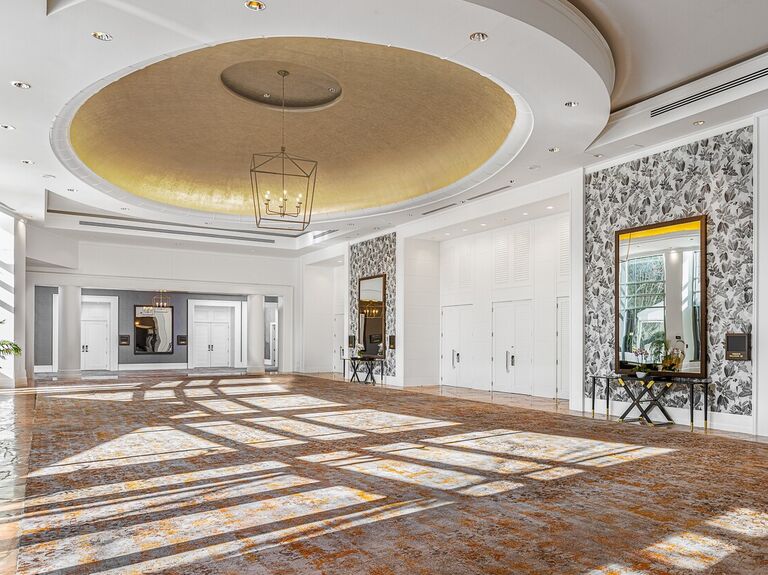 Empty event space with floor to ceiling windows