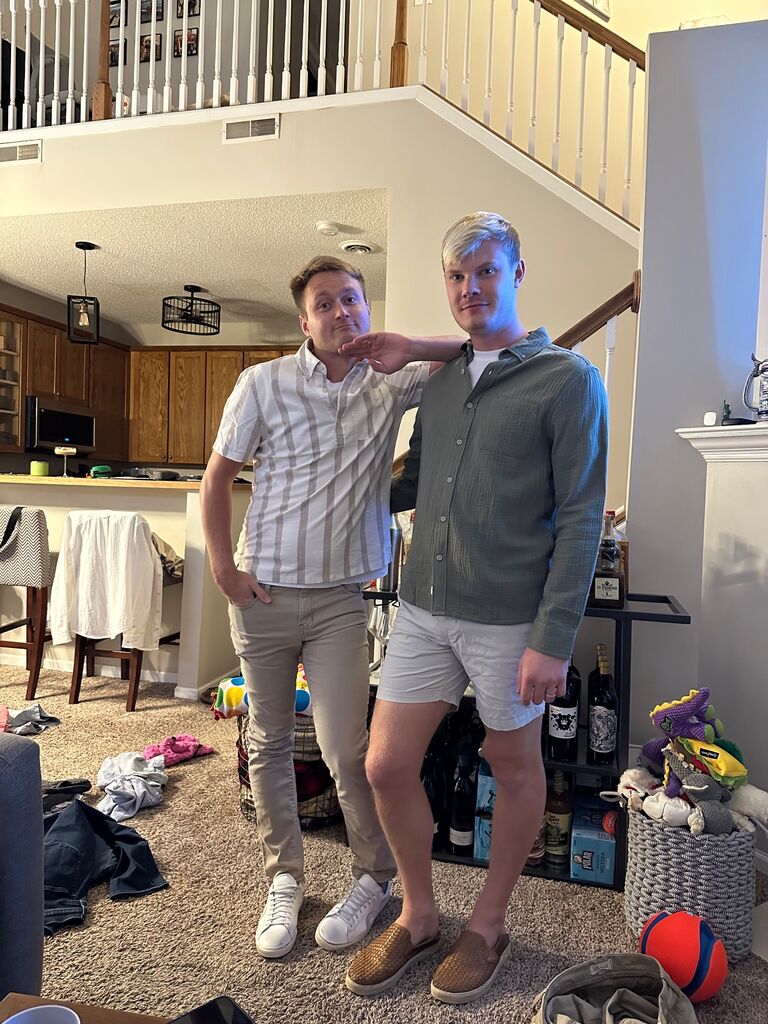 Trying on outfits for our engagement photos.