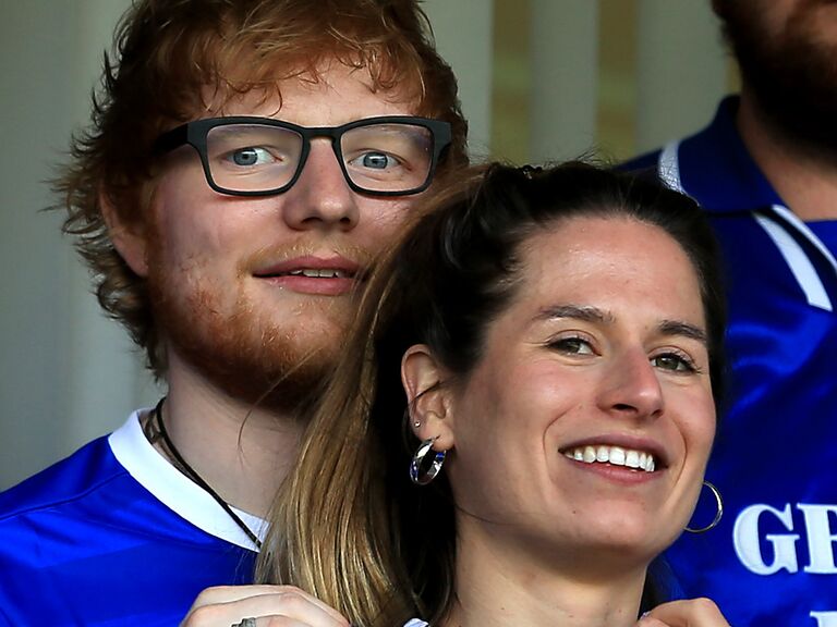 Musician Ed Sheeran and fiance Cherry Seaborn look on during the Sky Bet Championship match
