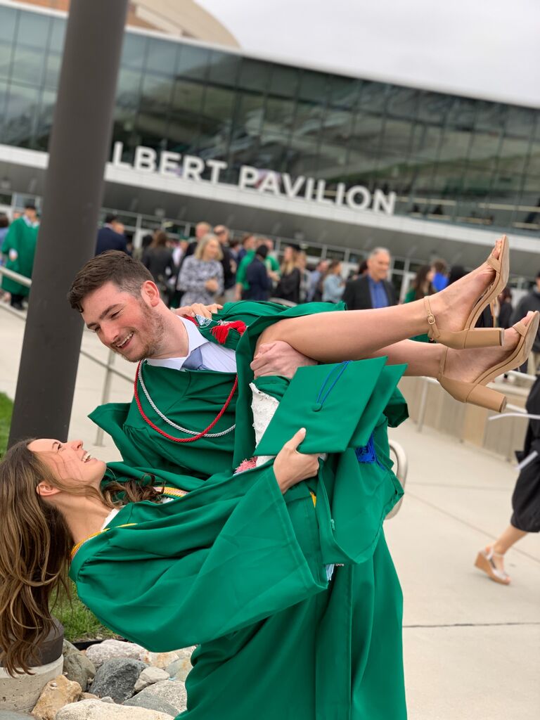 The day we graduated, introduced our families, and inadvertently started making a trend of the lifting/dip pictures