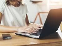 woman working on laptop