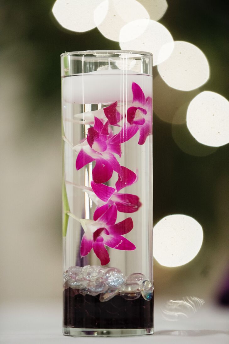 Centerpieces With Pink Orchids And Floating Candles