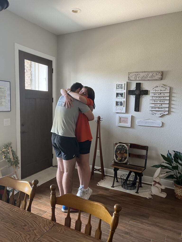 Em drives to FL to surprise Christian before leaving for a month and half to Uzbekistan.