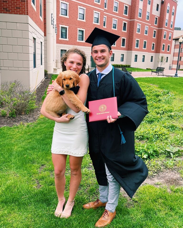 In May of 2022, Andy graduated from North Central College. Baylee had started her career  and lived in Nashville, TN and waiting for Andy to move there as well.  For Andy's graduation, Baylee welcomed their new dog, Nash, and flew with him to Chicago. 