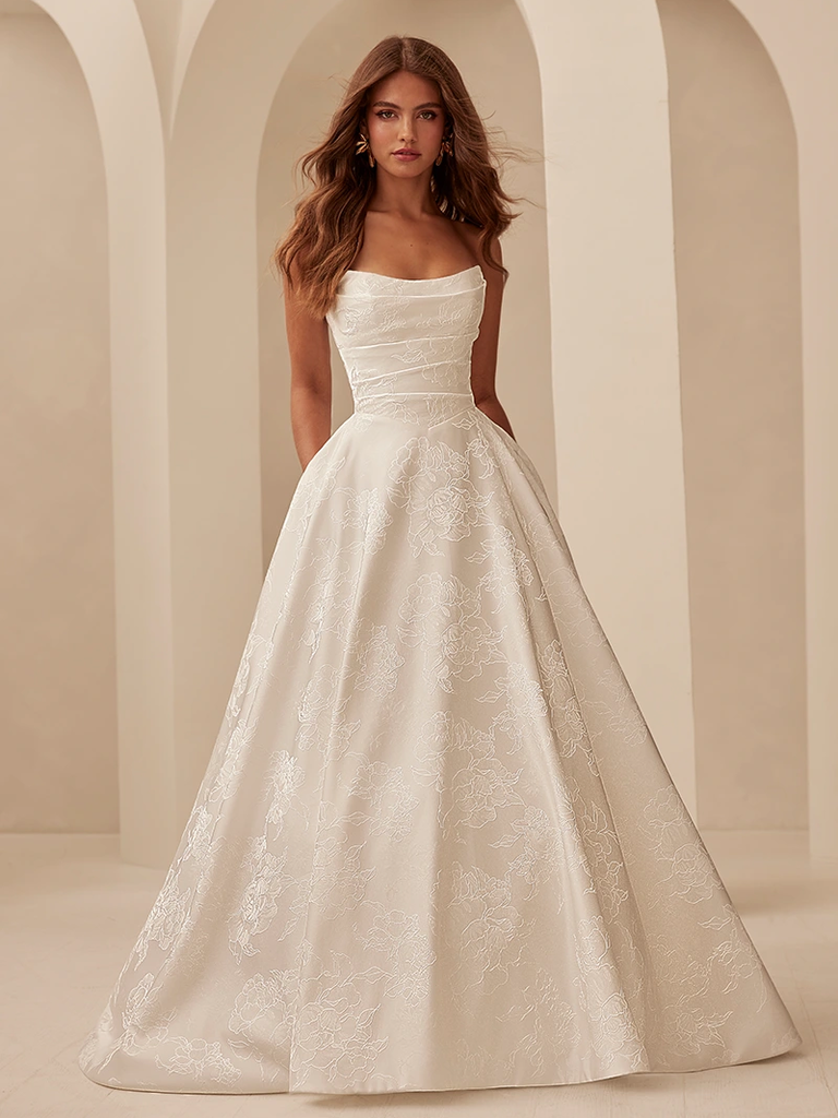 Strapless draped Jacquard bodice with scoop neckline and basque waistline