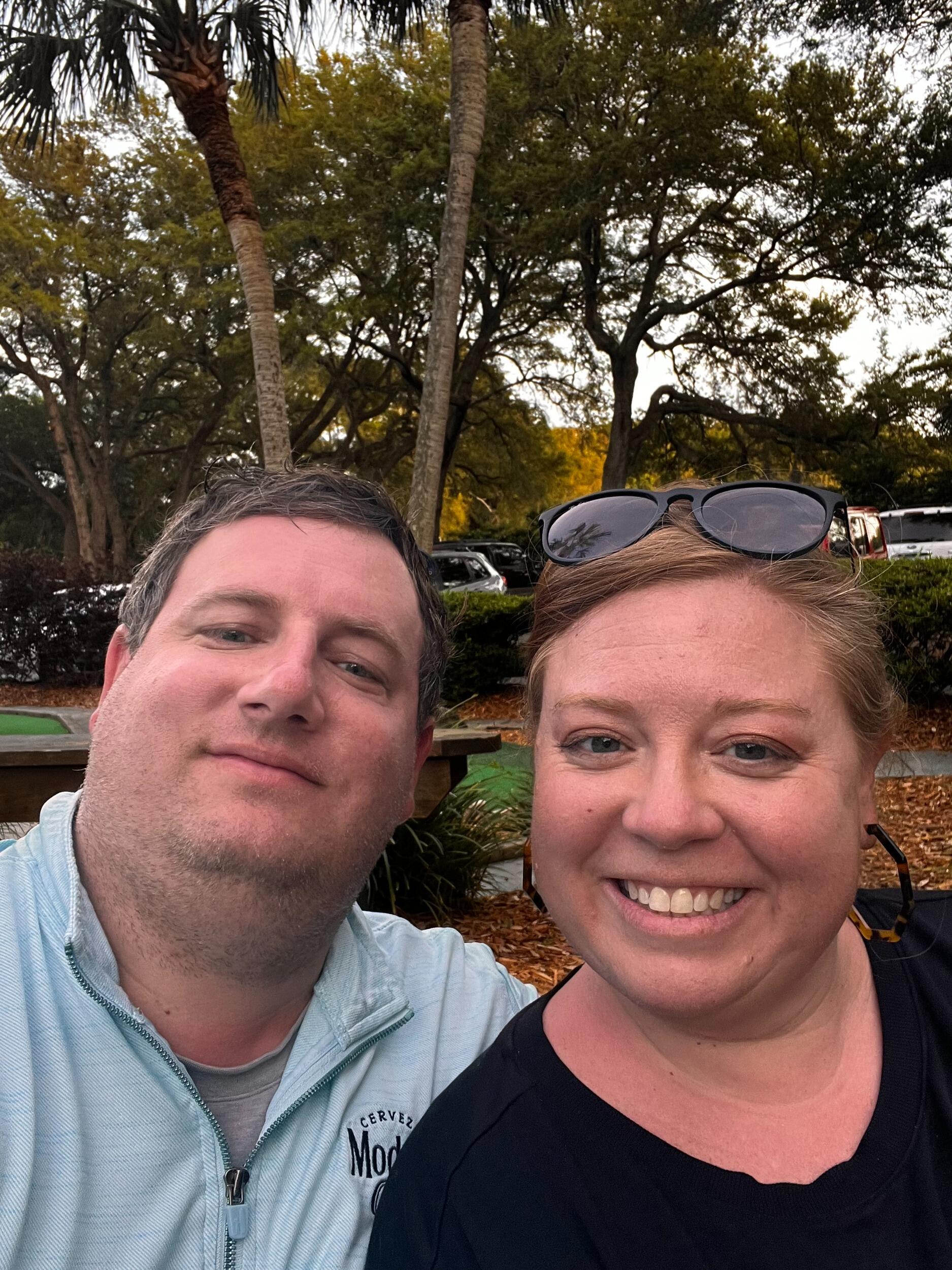 Greg wasn't smiling too long as Kim's 3 hole-in-one's whipped him at mini-golf (In my defense it wasn't my putter).