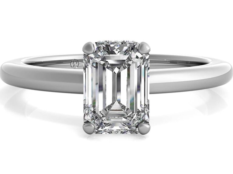 emerald-cut solitaire engagement ring on platinum band
