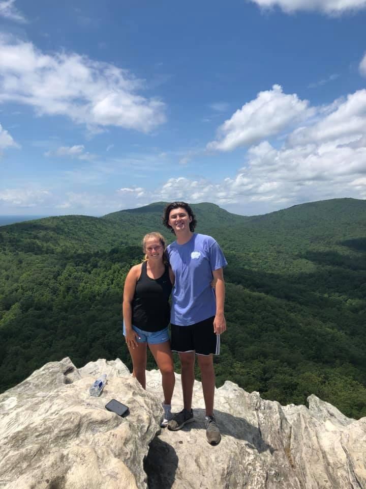 During summer breaks of college, Simon and Morgan were in long distance relationship. Morgan loved going to visit Simon and his family in Mount Airy. This is a picture they took at the top of Hanging Rock!