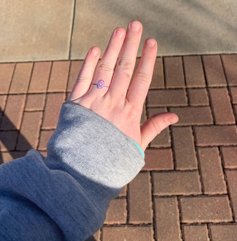 Jonny drew a fake ring on my finger, promising to one day replace it with a real one