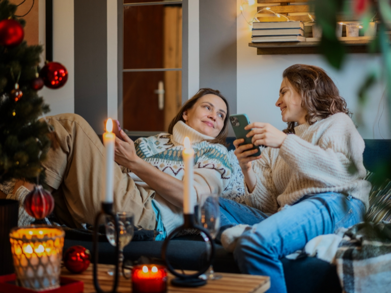 Christmas Happy Smiling Woman With Gift Box And Credit Card Stock