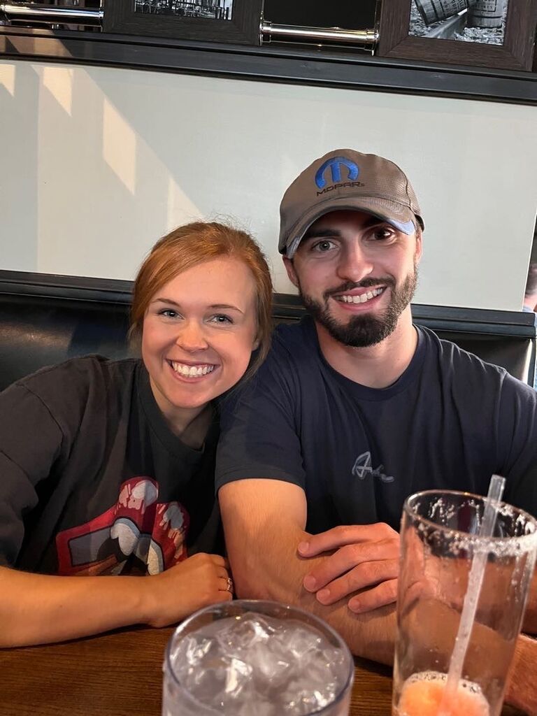 Bailey and Michael's first photo taken together. Eating lunch at Big Whiskey's during Bailey's national dance competition. 