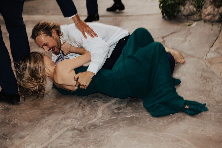Matt & Emma fighting to the death during a competition at Emma's mom's wedding
