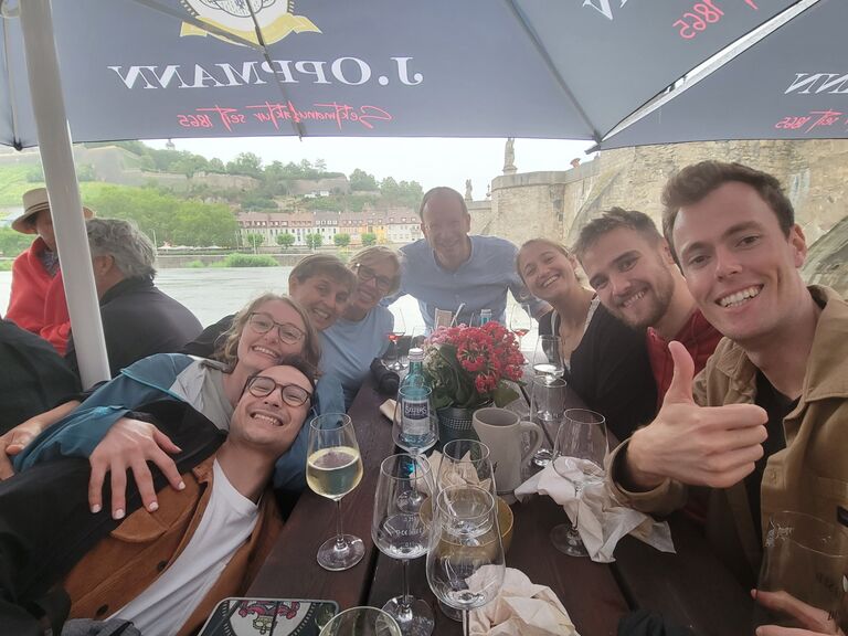Ella and Adam enjoy dinner with the Simmons and Botsch Families beside the Rhine River. 