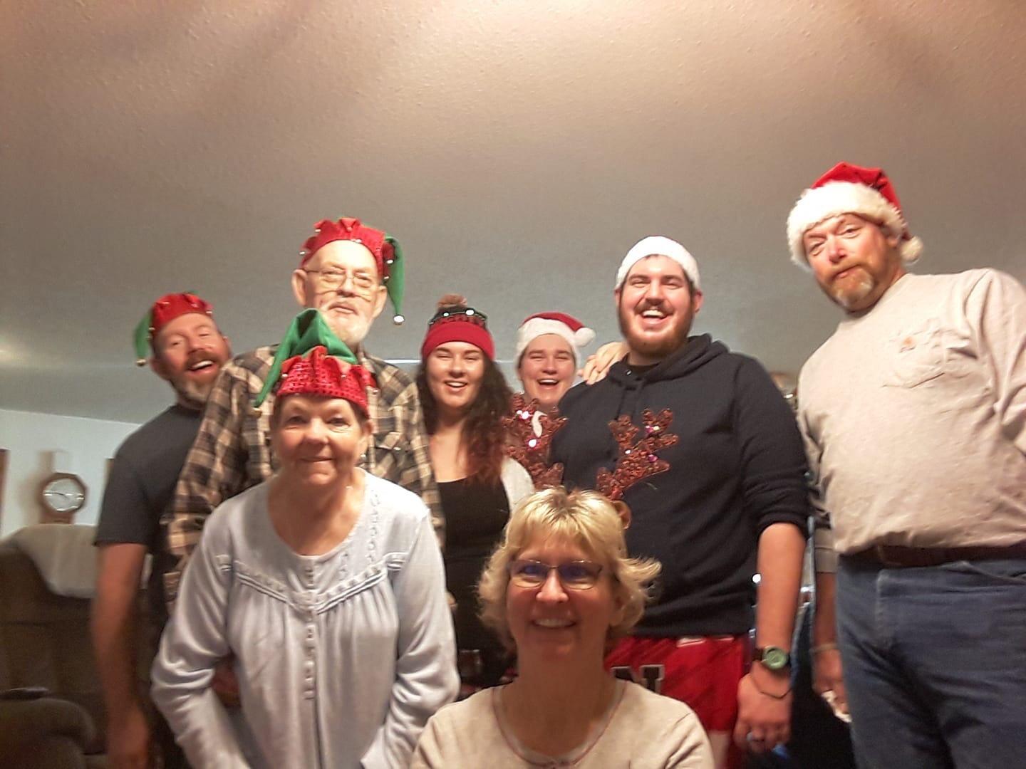 Our first Christmas together! Kat brought hats for everyone. Are we even a little bit surprised?
