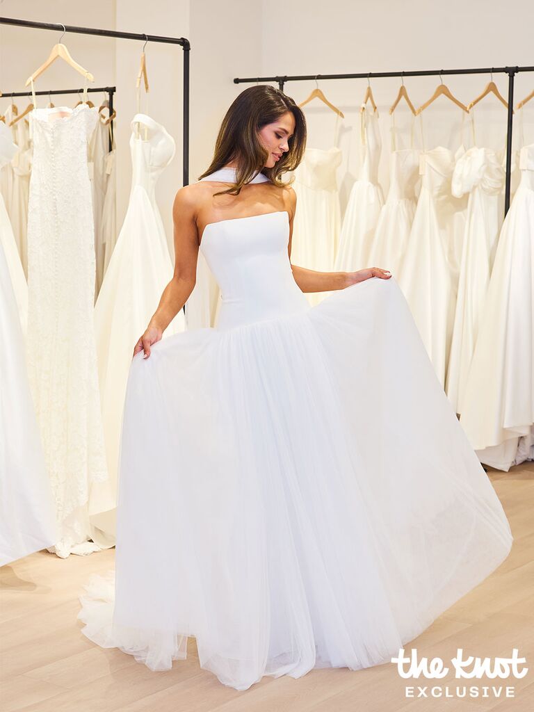 Kelsey Anderson twirling in a wedding dress