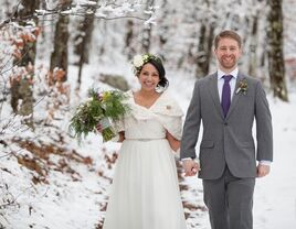 wedding couple walking in snow