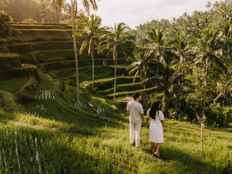 Couple visiting a rice field in bali