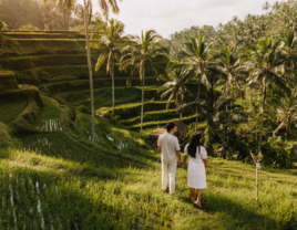 Couple visiting a rice field in bali