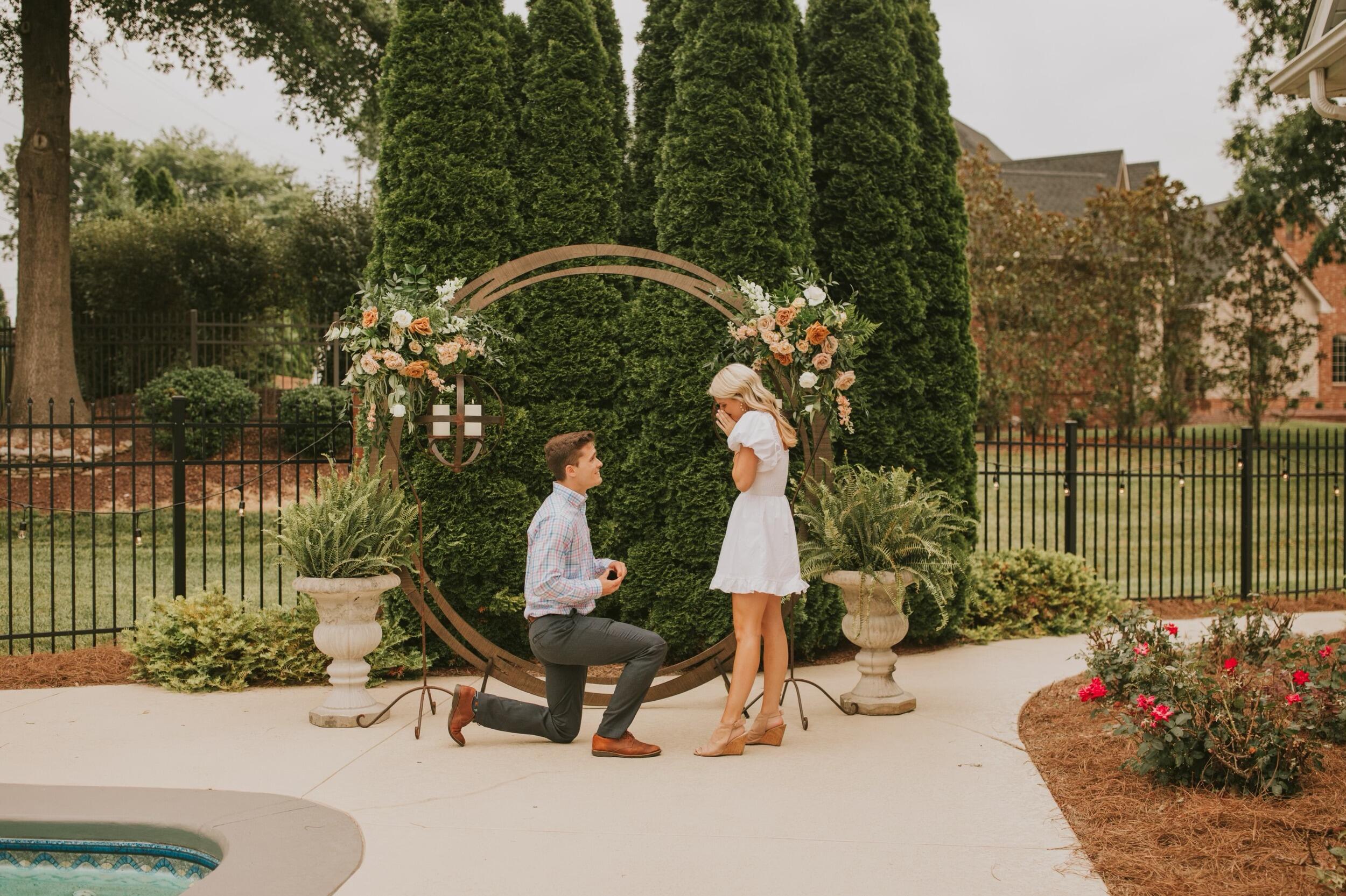 After taking family photos with Olivia's family in Monroe County, Reid surprised Olivia and got down on one knee when they returned to Bowling Green. Reid proposed with the wedding ring of Olivia's grandmother, Sarah Faye, making it even more perfect. Reid had all of their family & friends come out of hiding afterwards to celebrate! 