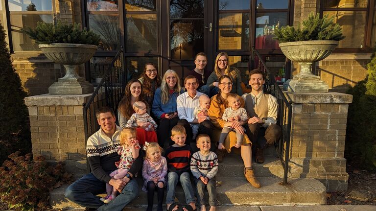 Keegan's first time in a Merdian family photo and first time meeting some of the Merdian family