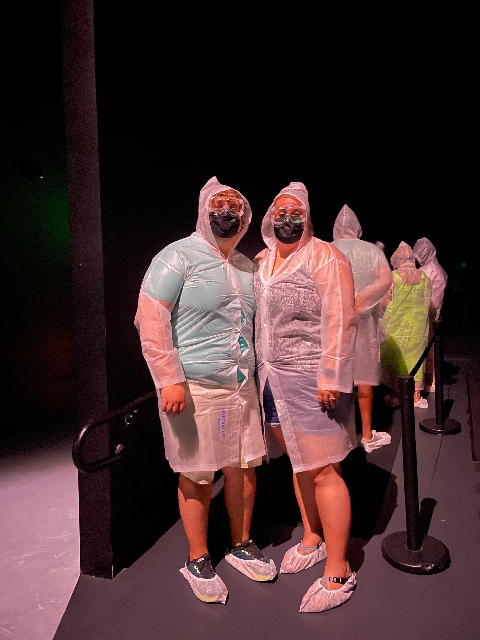 After Sarah & Brett got off the boat, they went to their hotel and took a nap. After that, they went to an interactive museum called "Super Blue." They got dressed up in protective gear so they could go into the "Cloud Room." They were covered in soap-like bubbles and had loads of fun!